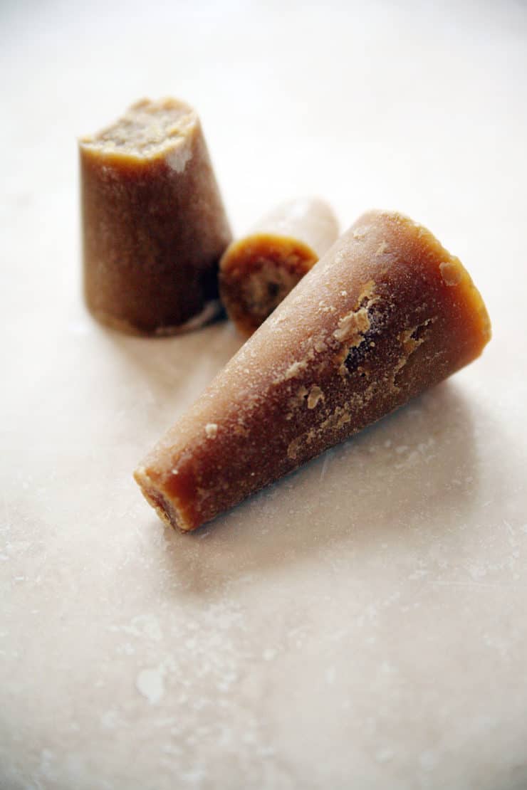 Closeup of piloncillo panela pieces on the table ready for calabaza en tacha syrup