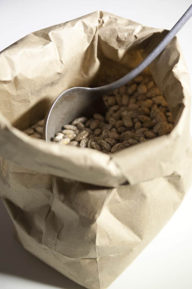 pinto beans in a paper bag to make frijole de la olla