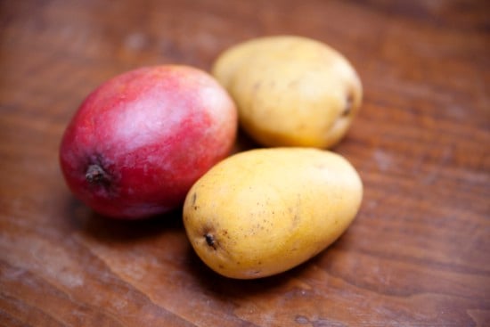 Three raw mango