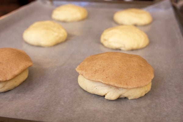 conchas pan dulce assembled on parchment paper