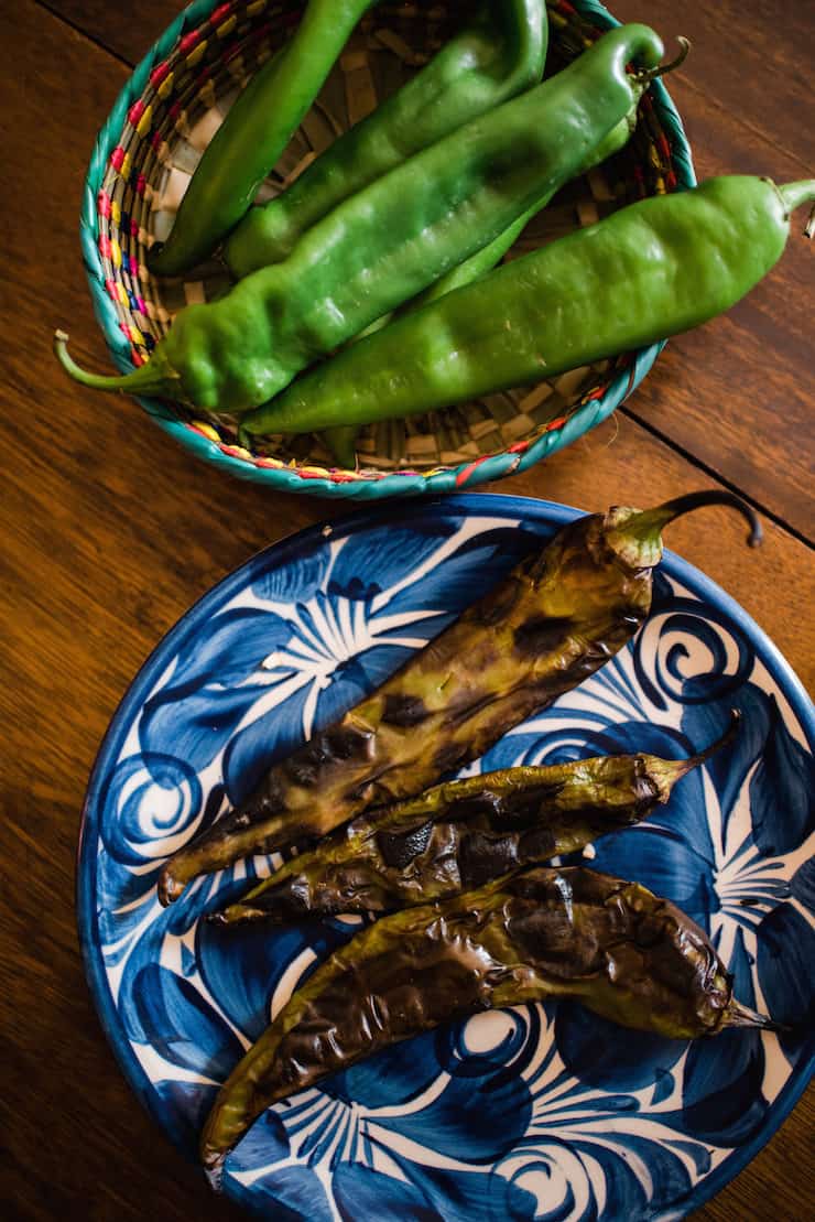 bowls filled with fresh hatch green chiles and roasted hatch green chiles for the no knead bread recipe