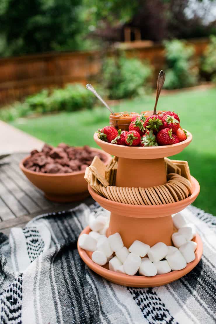 S'mores Bar Party | build your own s'mores party table with terra-cotta clay pots and lava rocks