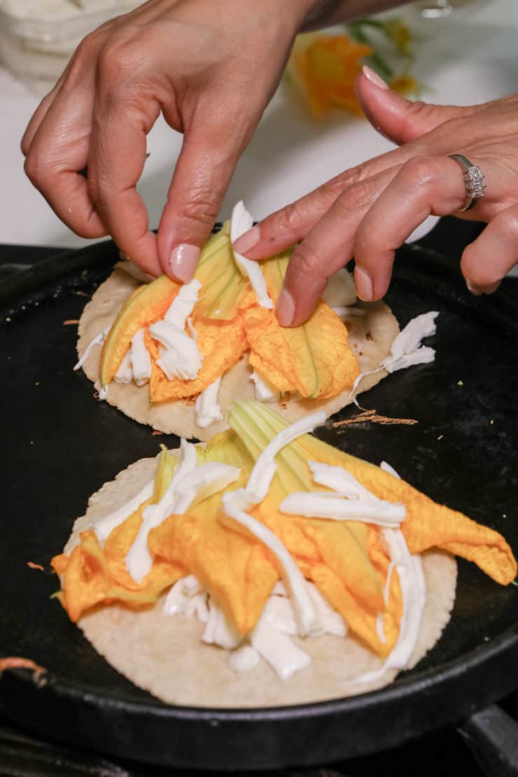 assembling squash blossom quesadillas to grill