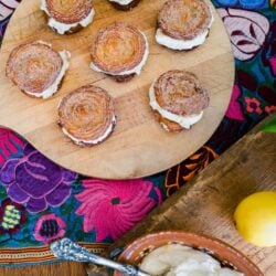 Churro Lemon Cream Sandwiches served on a wooden board