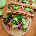 Easy Fish Tacos served on a wooden table