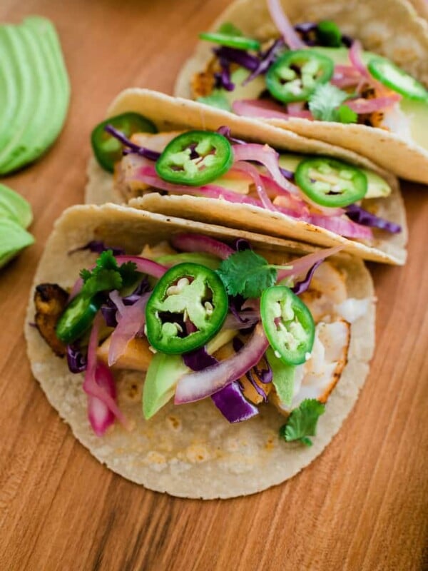 Easy Fish Tacos served on a wooden table