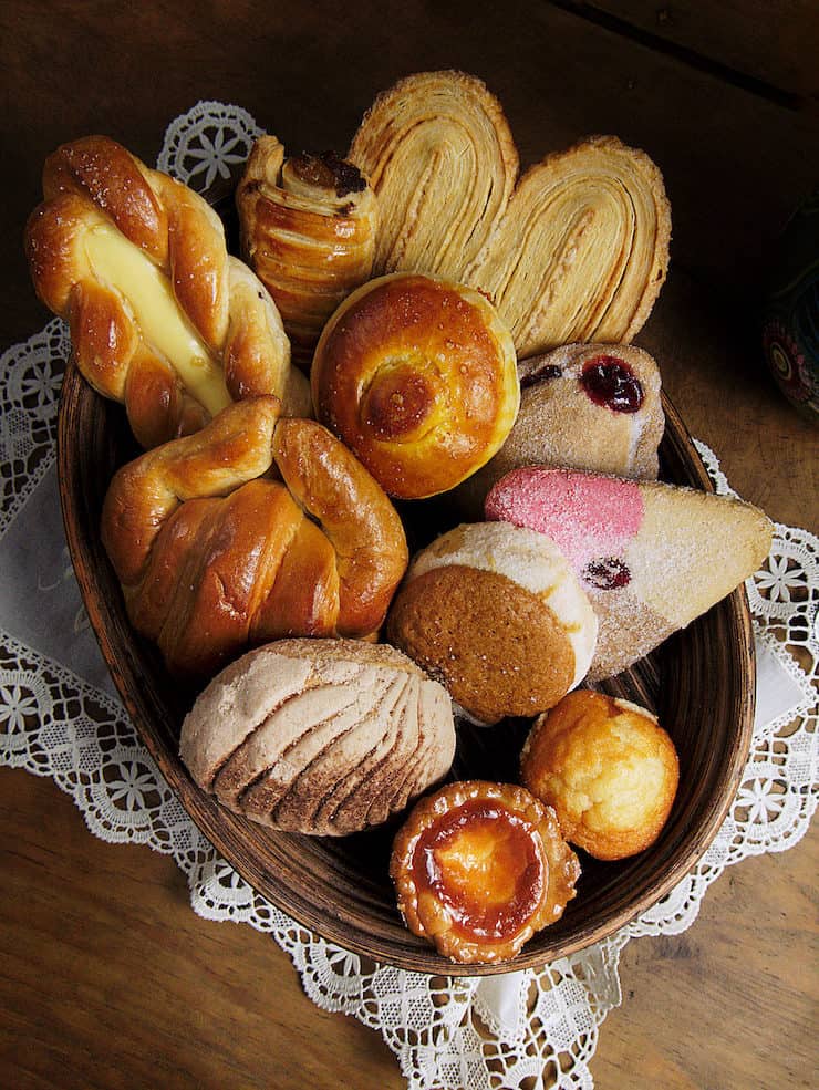 Mexican pan dulce from A to Z basket with an assortment of sweet bread