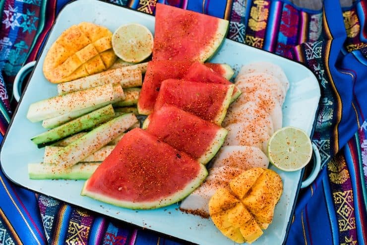 arrangement of fruit sprinkled with chili powder