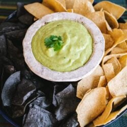 avocado tomatillo salsa in a small rustic dish