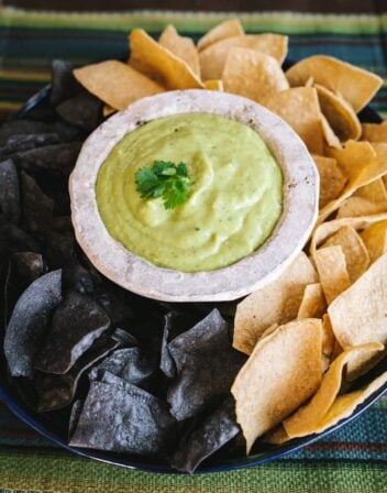 avocado tomatillo salsa in a small rustic dish