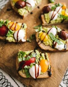 Heart-Healthy Caprese Avocado Toast served on a wooden board