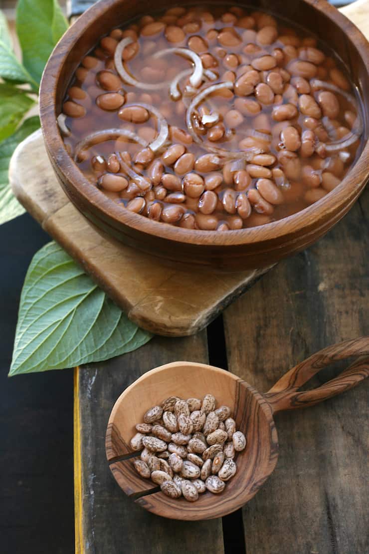 frijoles de la olla in a wooden bowl made on stovetop or Instant Pot