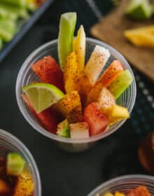 Serving delicious Mexican Fruit Cups