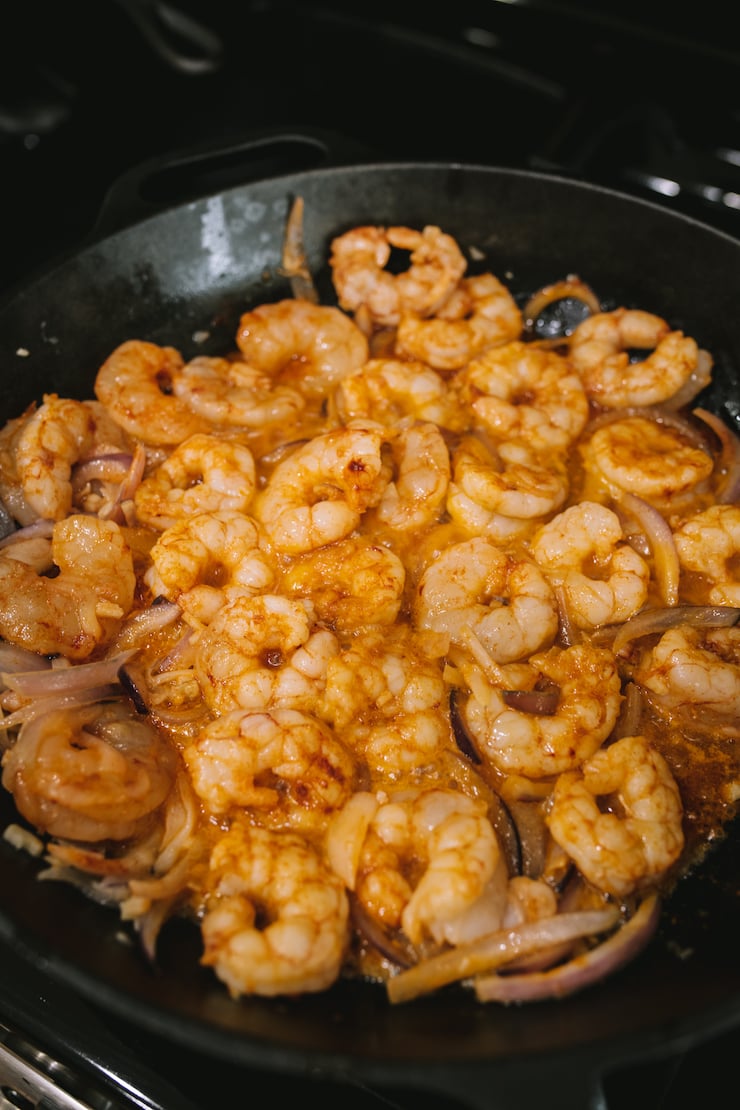 buttery shrimp in a skillet Camarones al Mojo de Ajo (Mexican-Style Garlic Shrimp)