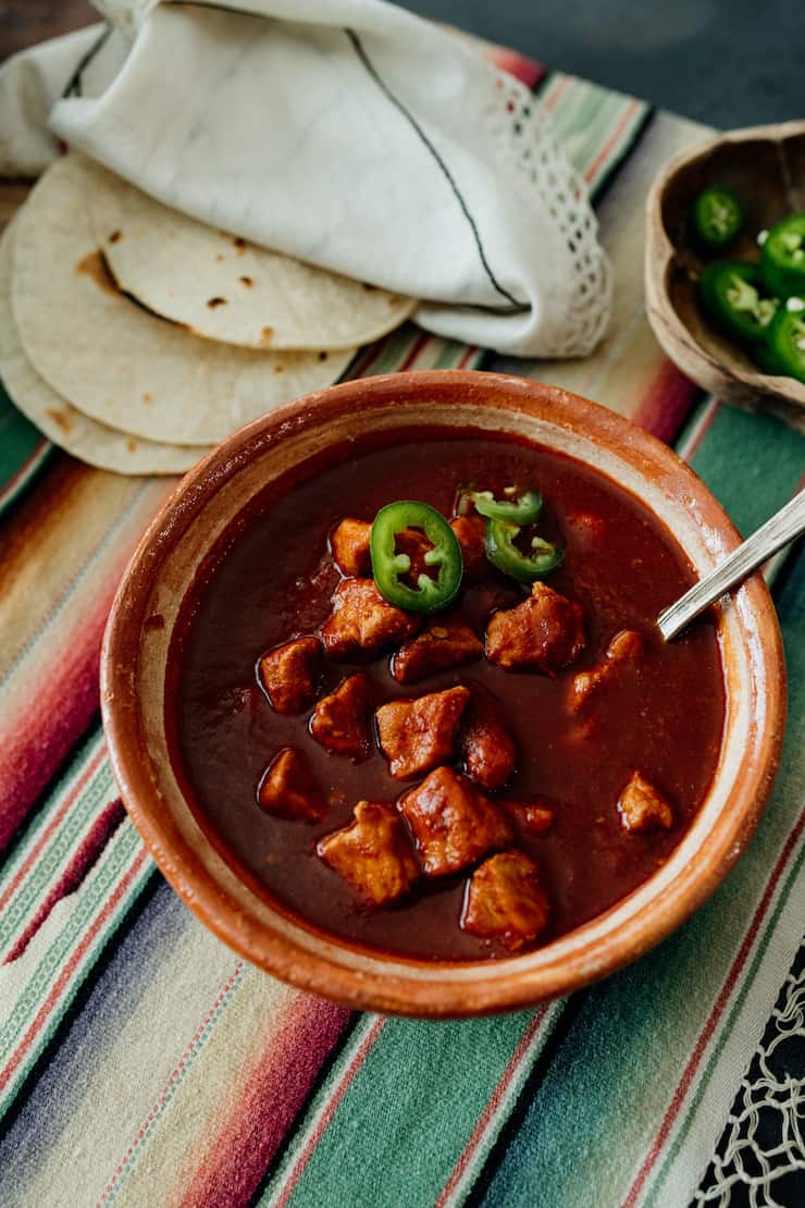 bowl of Asado de Chile Colorado (Pork in Red Chile Sauce) 