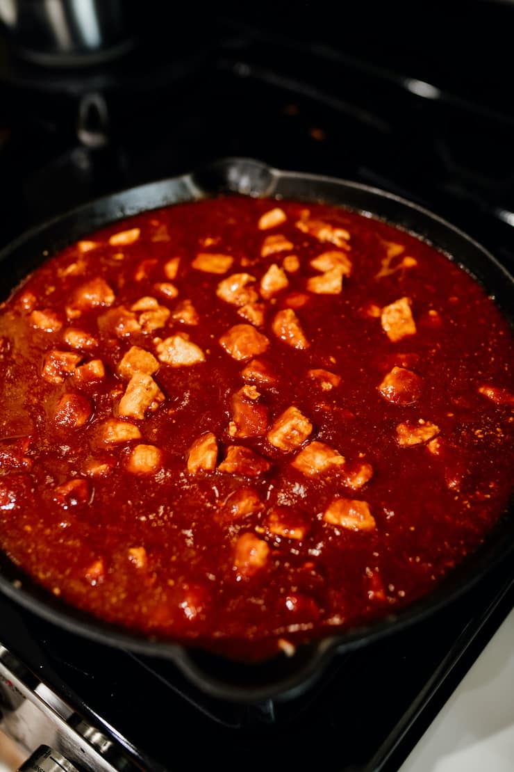 asado de puerco chili colorado simmering on the stovetop. 