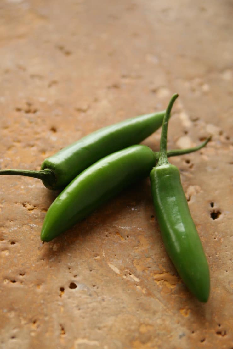 three serrano chile peppers