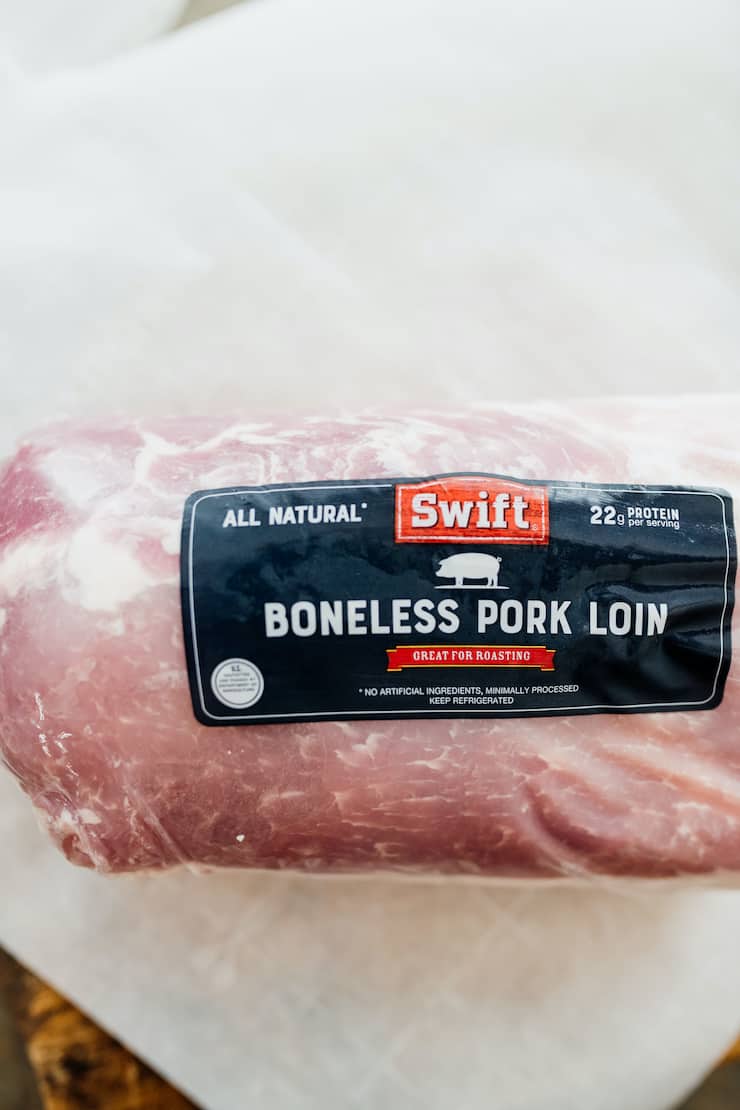 package of boneless pork loin still in the plastic wrapper. 