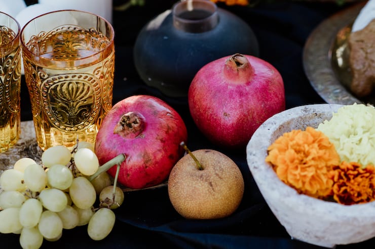 drinks water and fruit marigolds on day of the dead die de Muertos altar