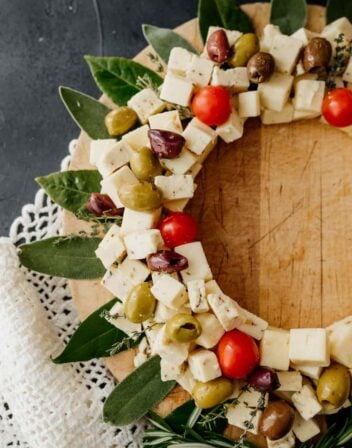 side shot of a christmas wreath shaped cheese board
