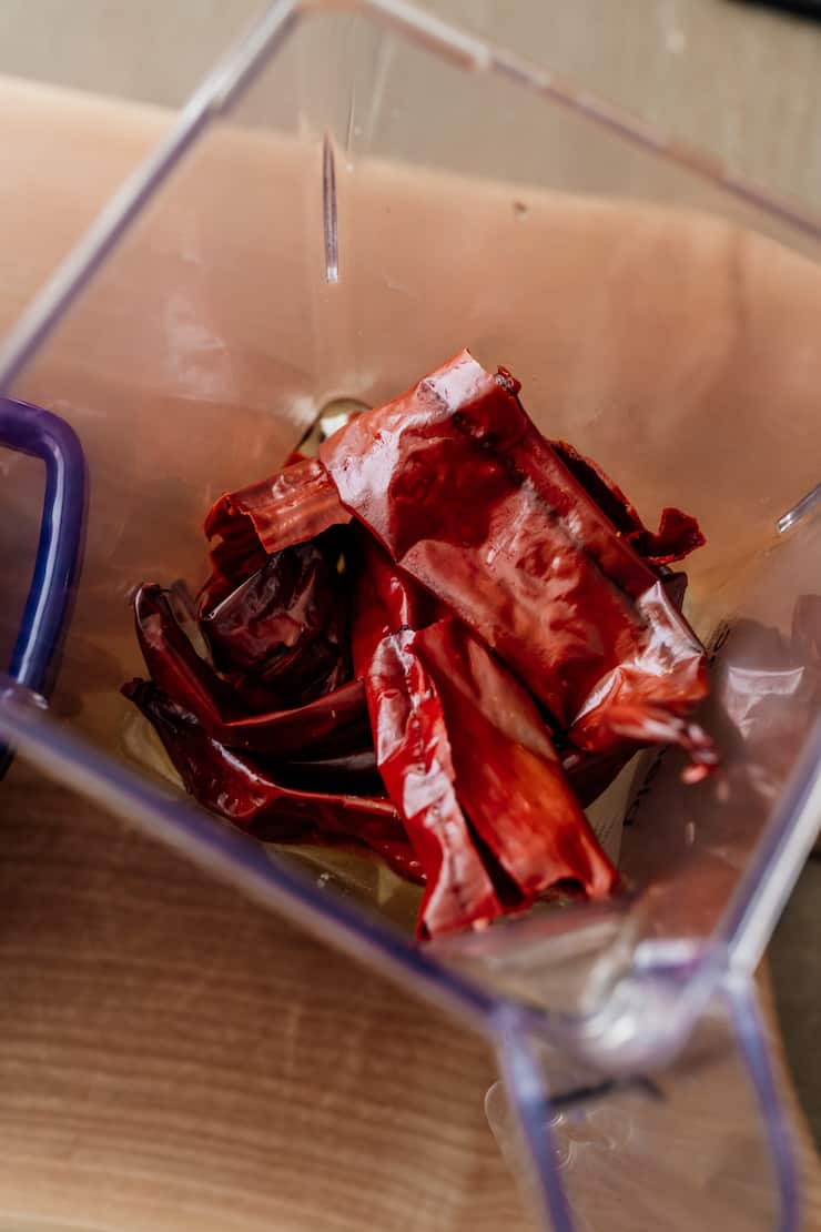 soaked dried red chiles in blender pitcher
