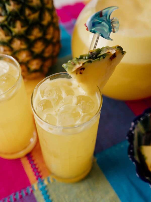 agua de piña in a tall clear glass