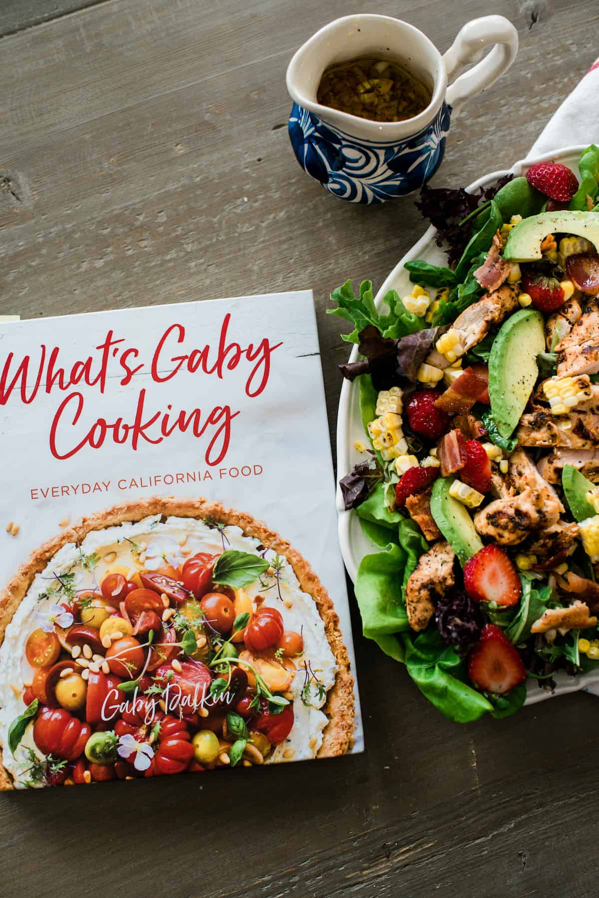 what's gaby cooking cookbook next to the plated summer chipotle chicken salad
