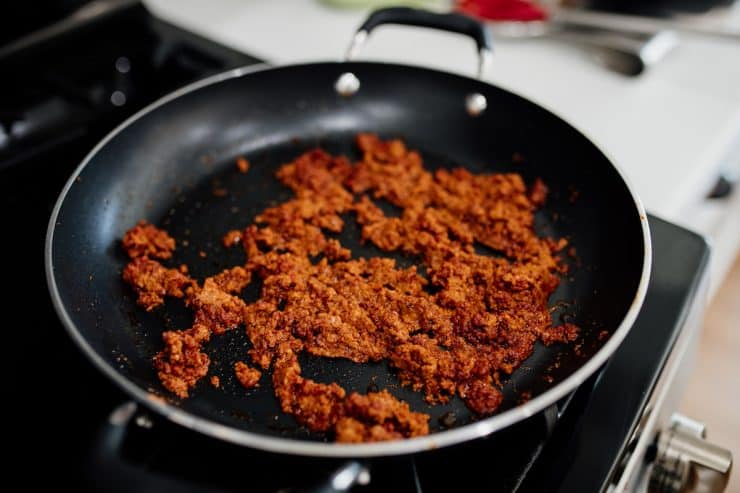 mexican chorizo browning in a sauté pan