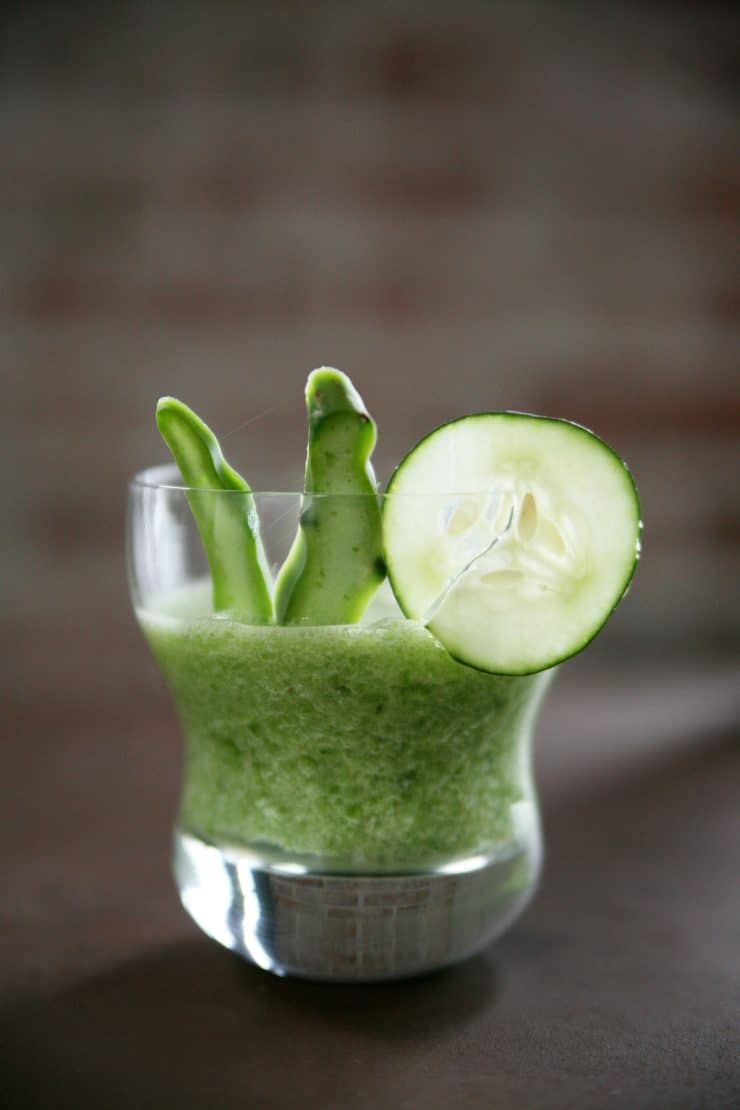 Licuado de nopal cactus smoothie with cucumber and lime in a clear glass