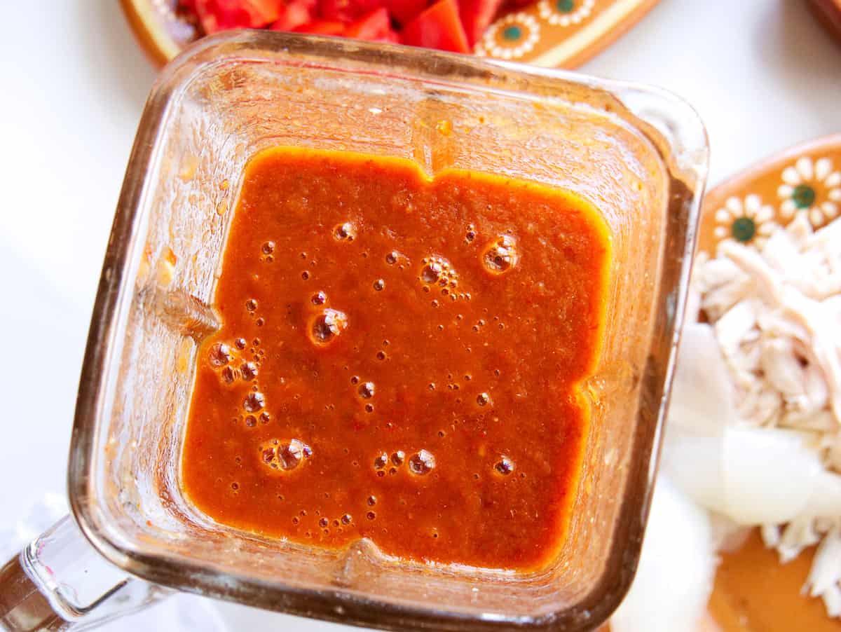 overhead shot of mexican tinga sauce in a blender.