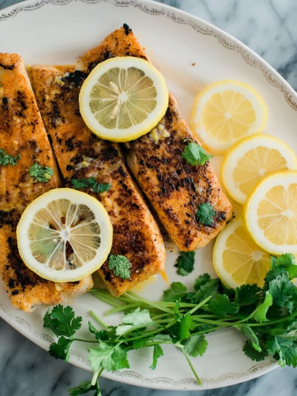 Lemon Butter Fish served with lemons and herbs