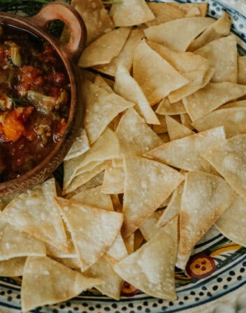 platter of homemade tortilla chips served with fresh salsa.