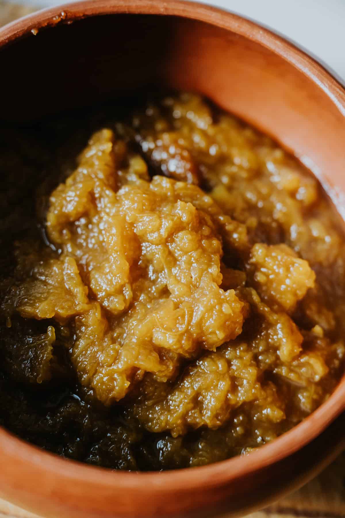 Homemade Mexican pumpkin purée with cinnamon and piloncillo in a rustic bowl.